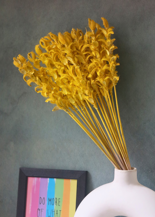 Yellow ginger flower bunch in vase 