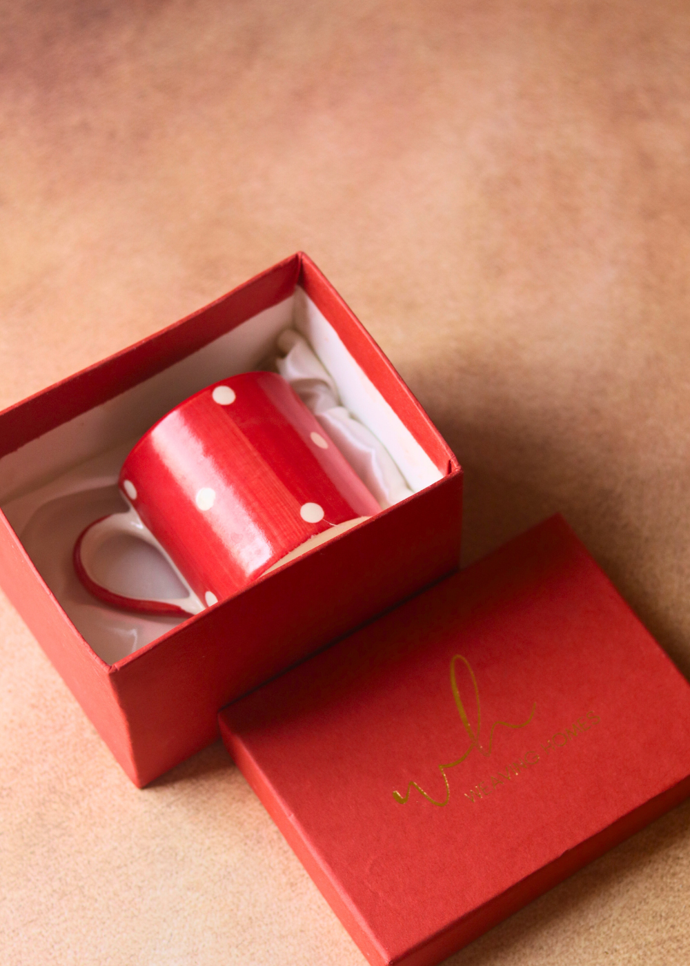 Red coffee mug in gift box 