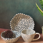 Black polka ceramic bowls & coffee mug