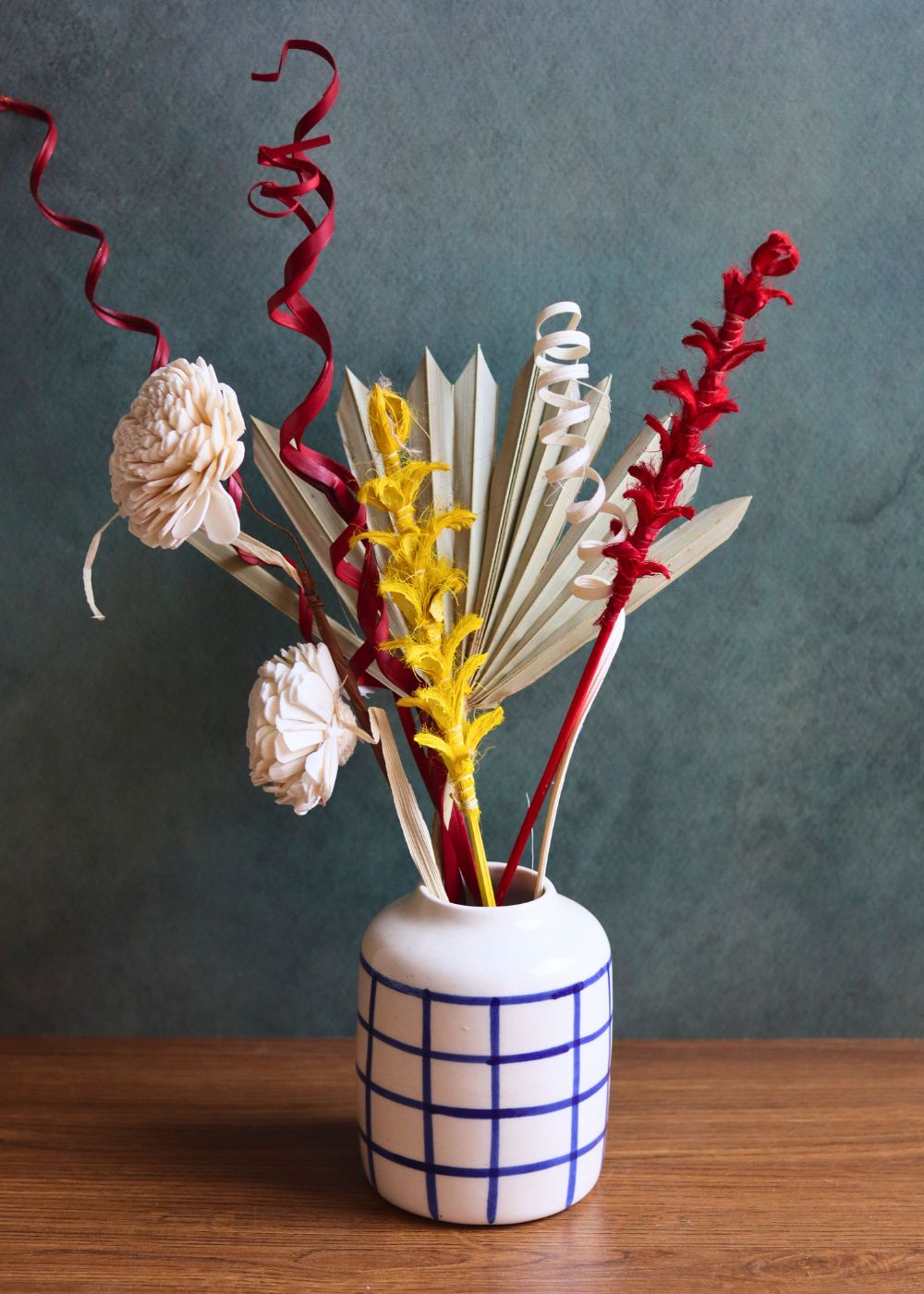 chequered blue vase with assorted bunch combo made by handcrafted 