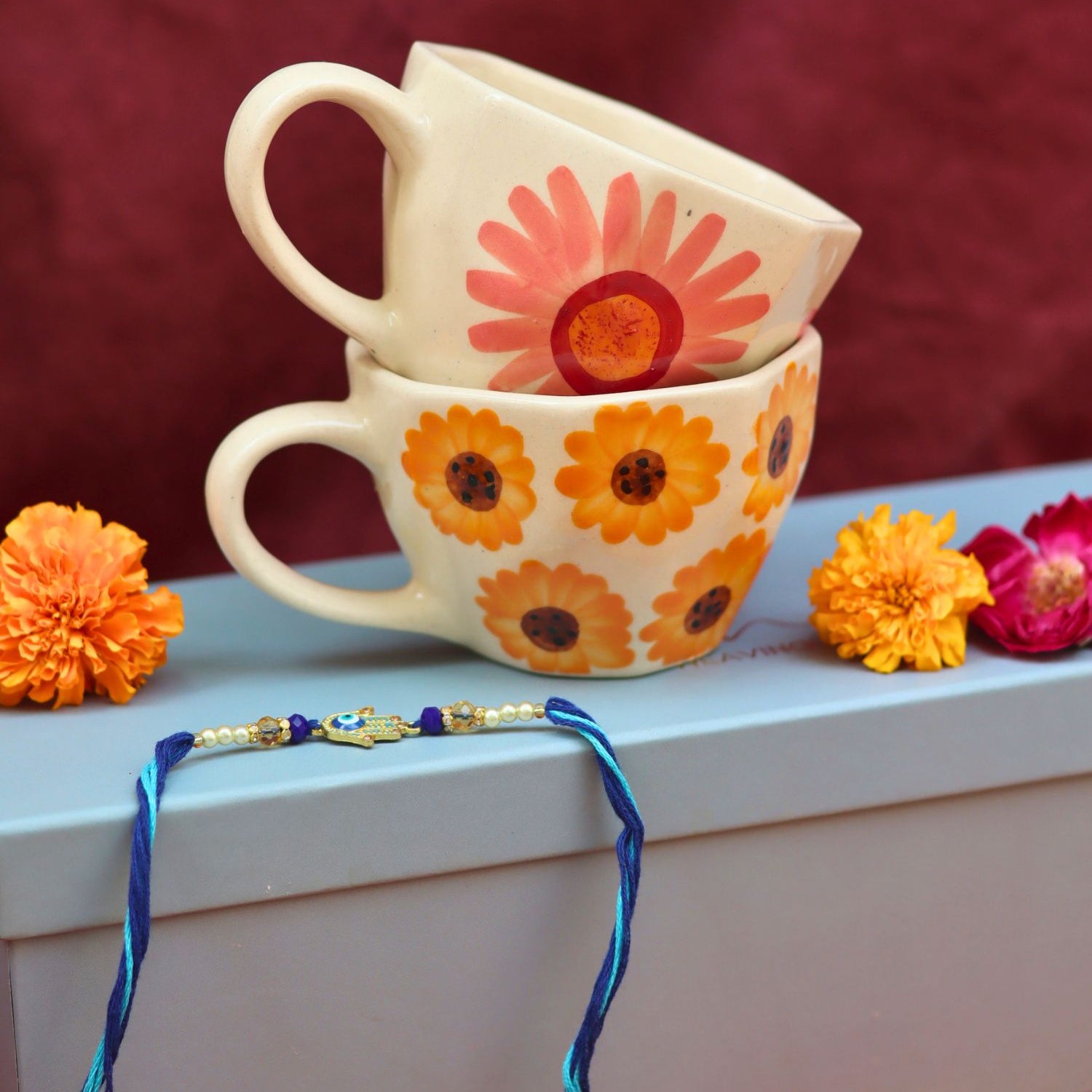Surajmukhi & Flower Mug Rakhi Gift Box made by ceramic
