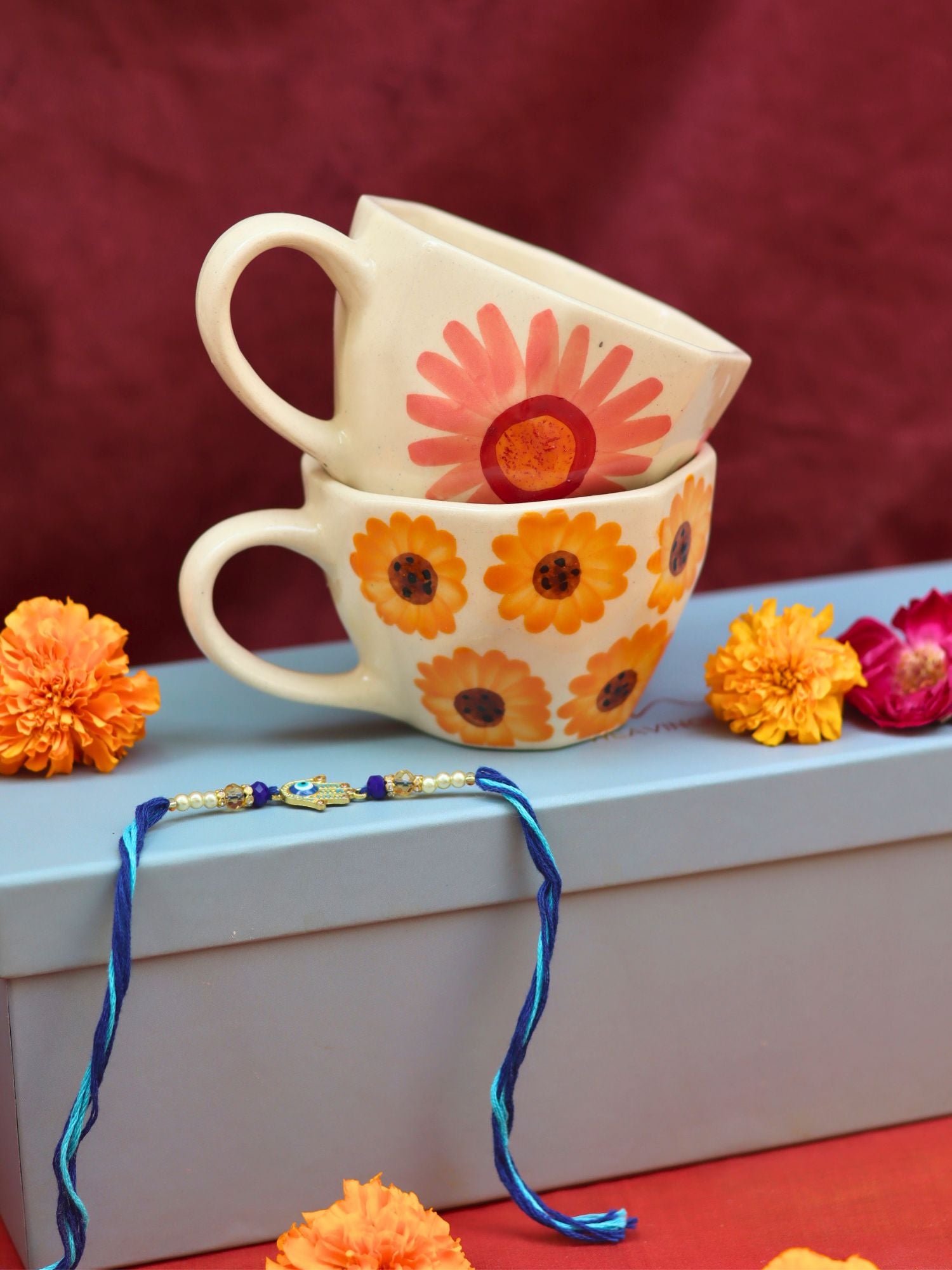 Surajmukhi & Flower Mug Rakhi Gift Box made by ceramic