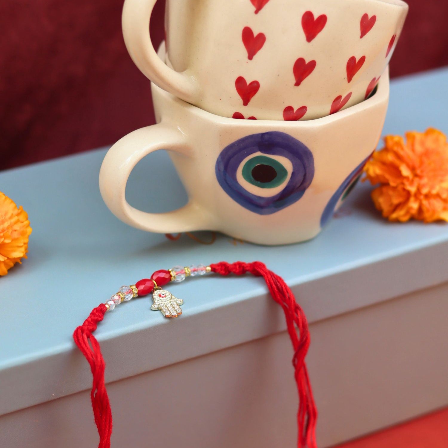 Heart & Evil Eye Mug Set Rakhi Gift Box made by ceramic