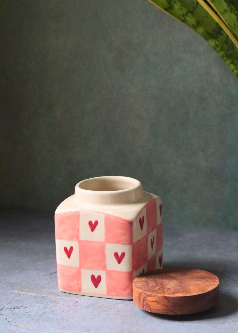 chequered heart jar made by ceramic 