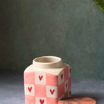 chequered heart jar made by ceramic 