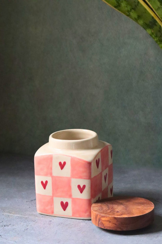 chequered heart jar made by ceramic 