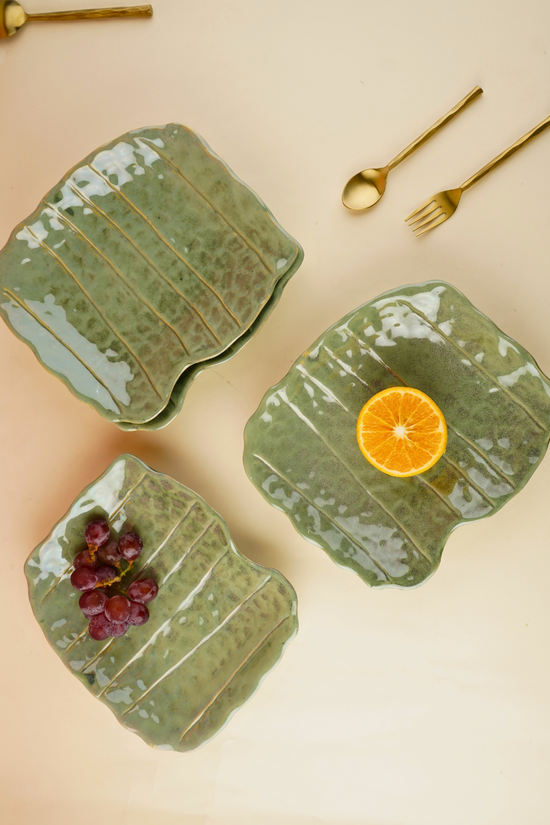 handmade pistachio stoneware platter with golden cutlery