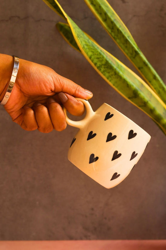 black heart mug handmade by ceramic 