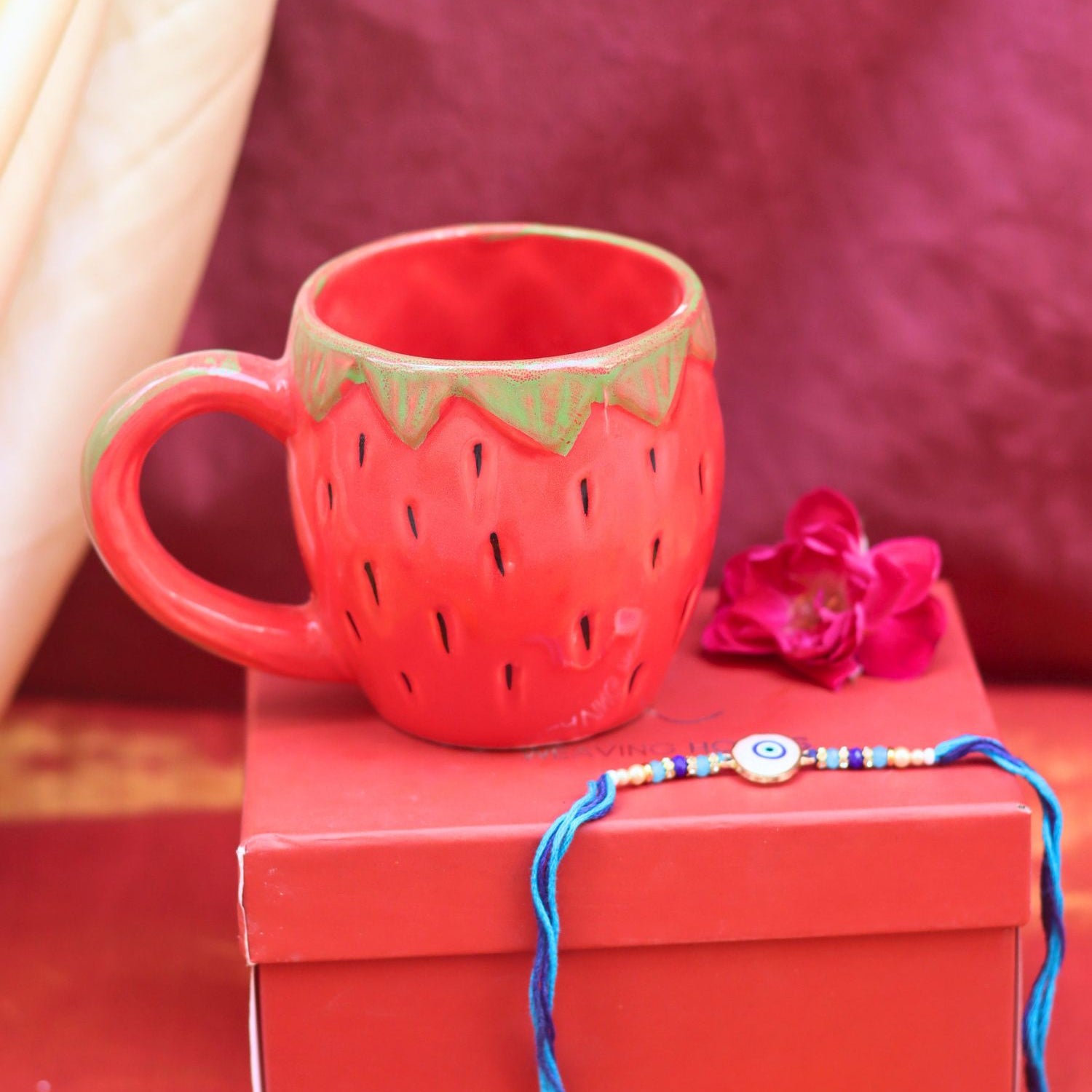 OG strawberry Rakhi Gift Box made by ceramic