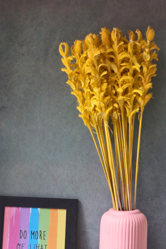 Natural dried yellow ginger flower bunch in vase 