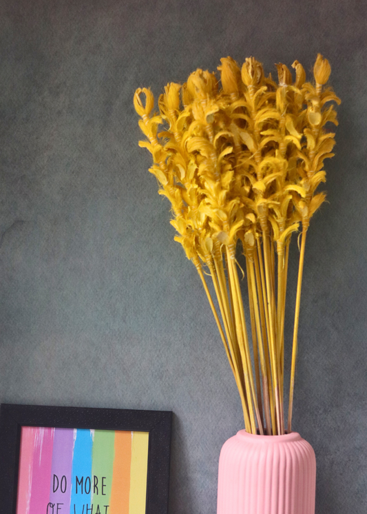 Natural dried yellow ginger flower bunch in vase 