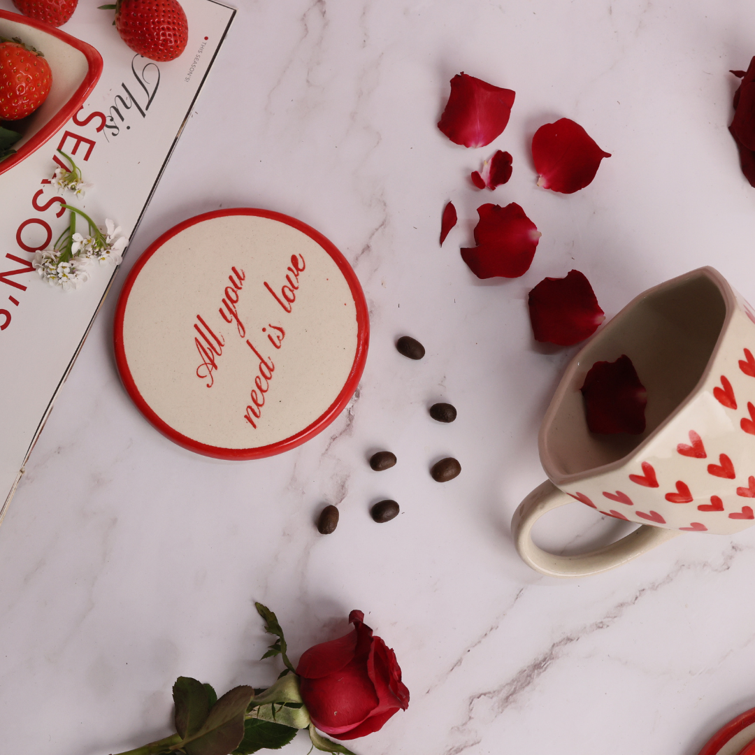 handmade heart mug with all you need is love coaster made by ceramic  