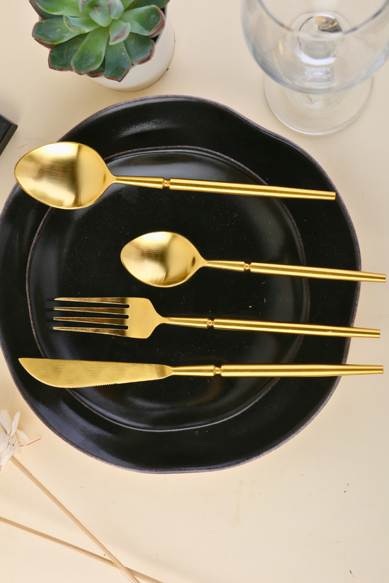 golden tranquility cutlery set of 4 made by steel 