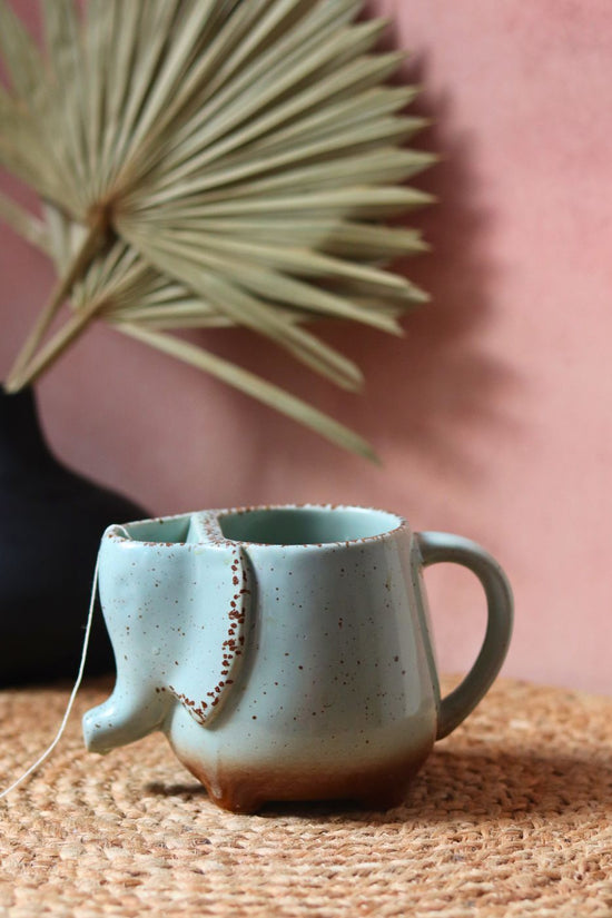 ele mug made by ceramic 