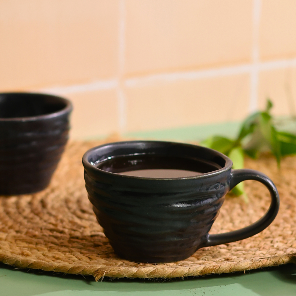 bold black color coffee mug with coffee