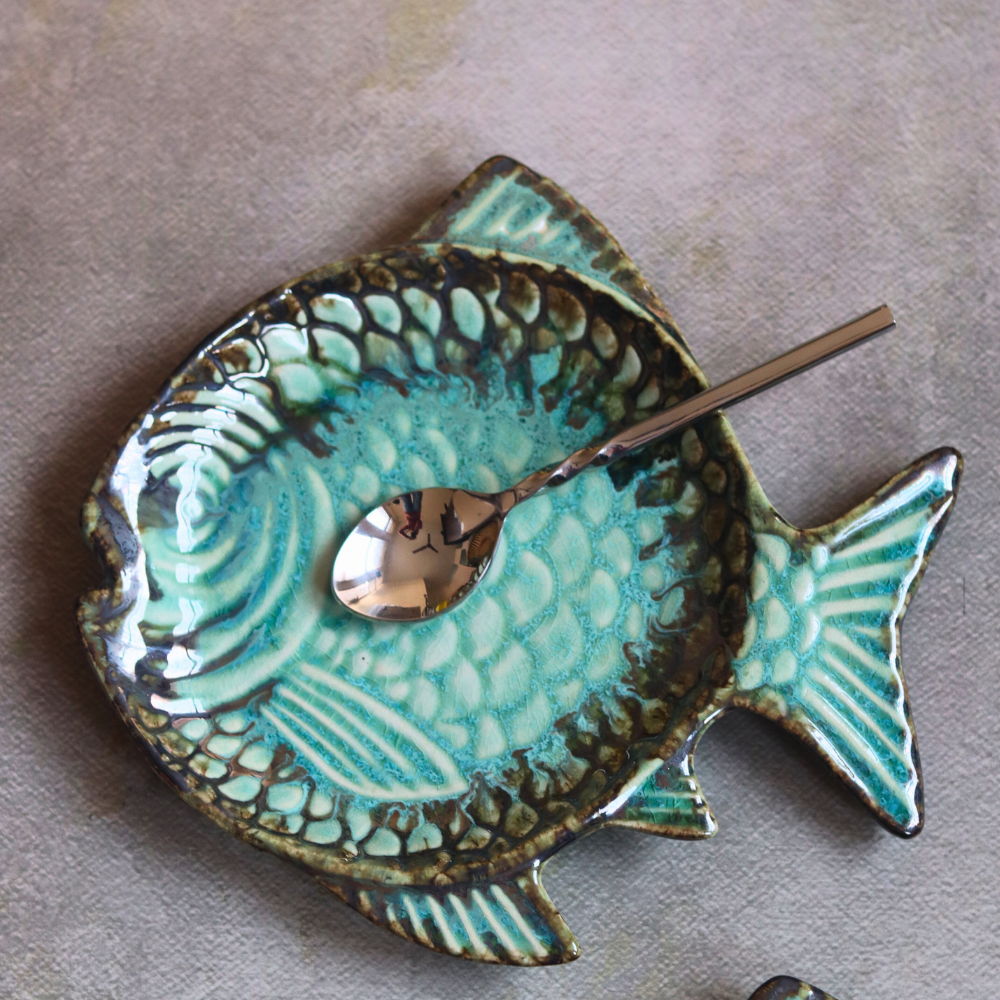Sea green fish platter with spoon