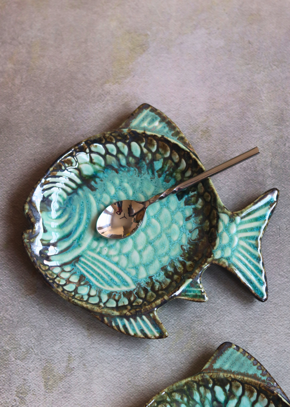 Sea green fish platter with spoon