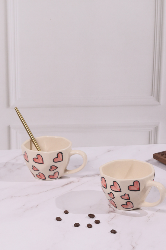 Two pink heart mugs