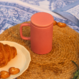 Ceramic coffee mug with lid