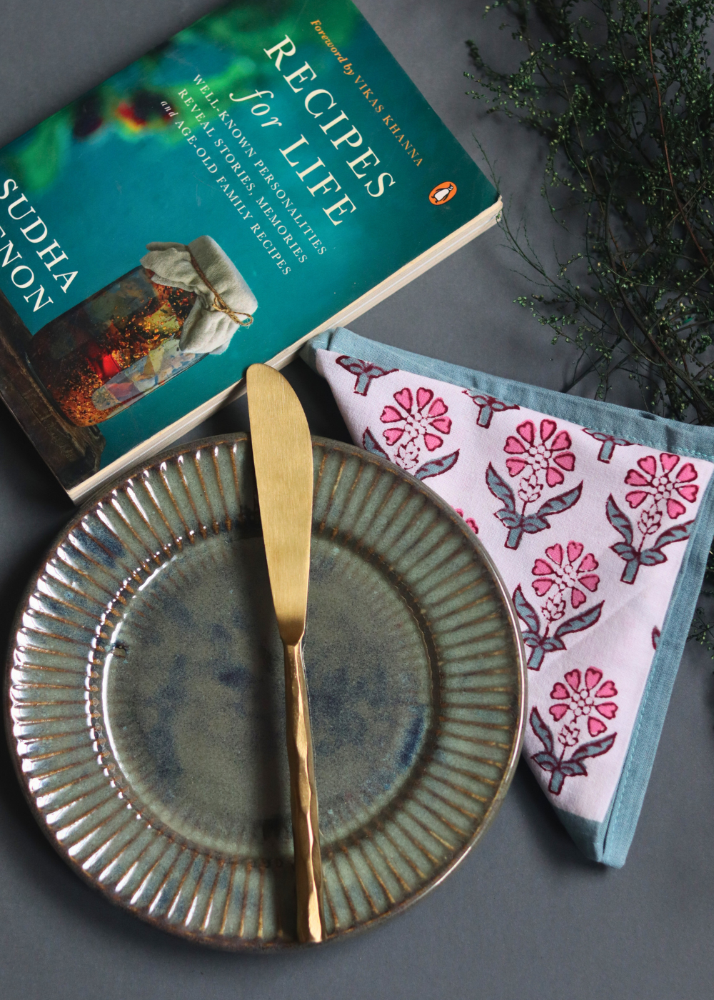 Serveware handmade knife on plate with book 