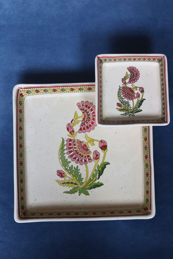 red motif platter made by ceramic 