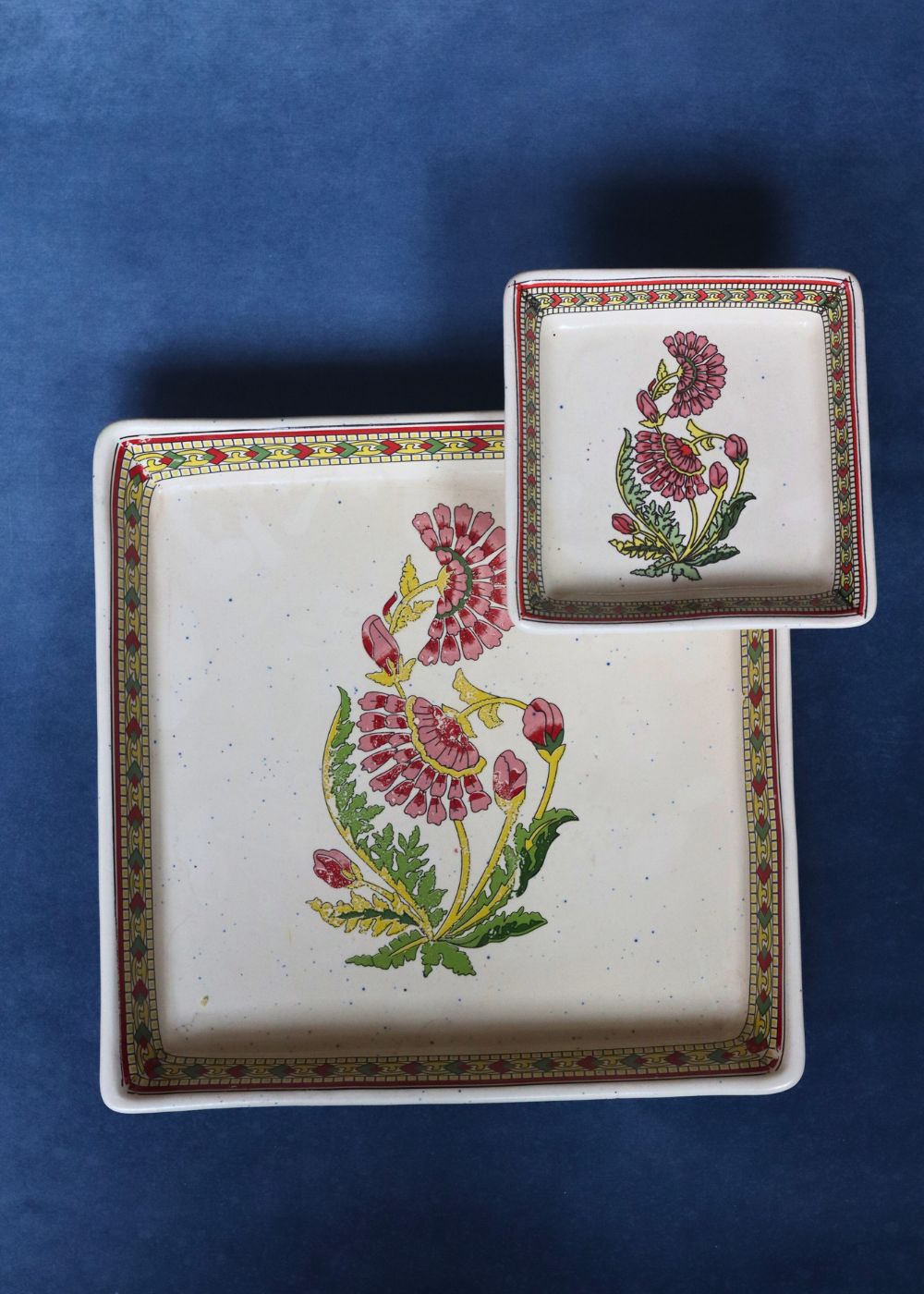 red motif platter made by ceramic 