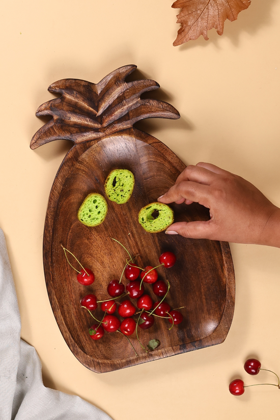 Pineapple shaped wooden platter with cherries 