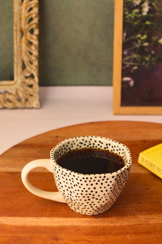 black polka mug with black & white color 
