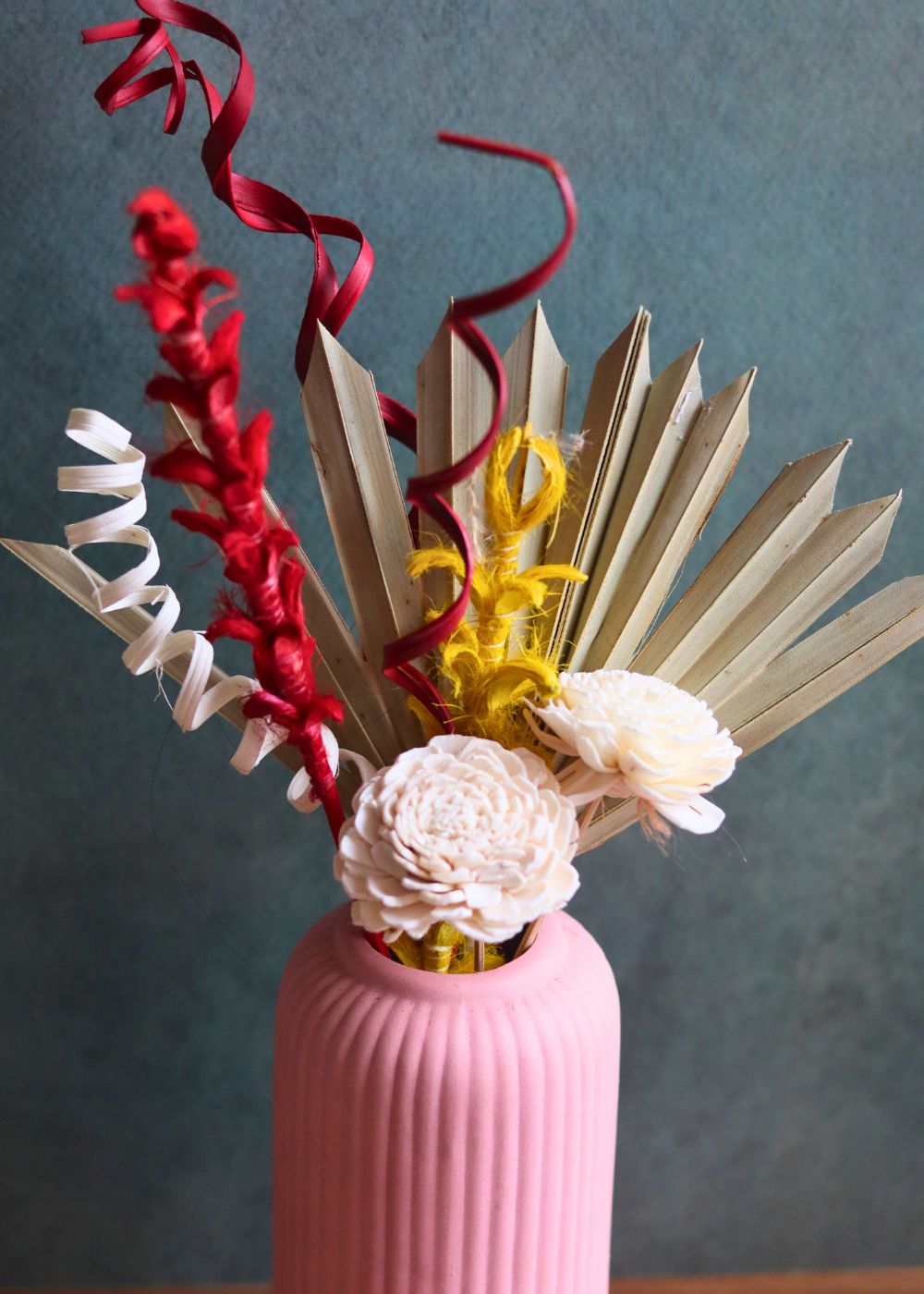 this vase With Assorted bunch made by handcrafted