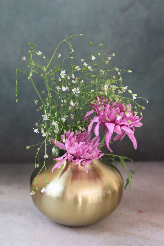 Brass zahara flower vase with flowers