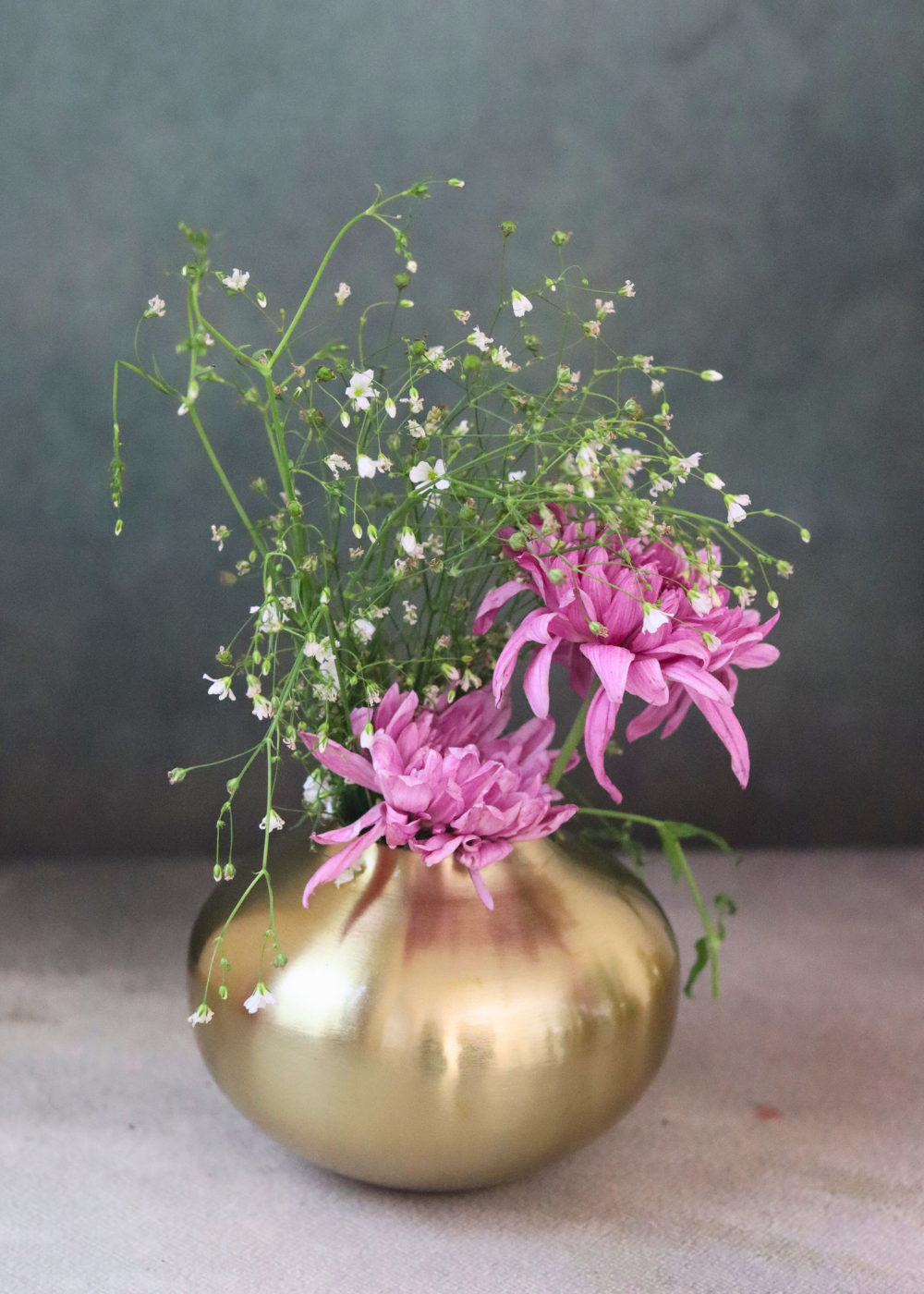 Brass zahara flower vase with flowers