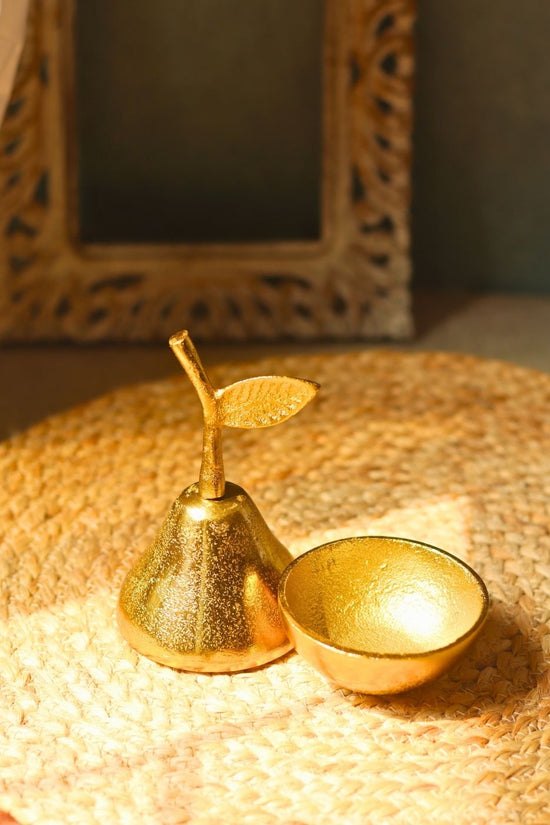 golden jar made by metal