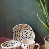 Black dotted coffee mug & bowls