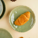 ceramic pistachio stoneware quarter plate with golden cutlery
