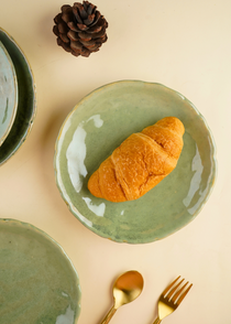 ceramic pistachio stoneware quarter plate with golden cutlery