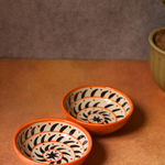 Ceramic orange spiral nut bowls 