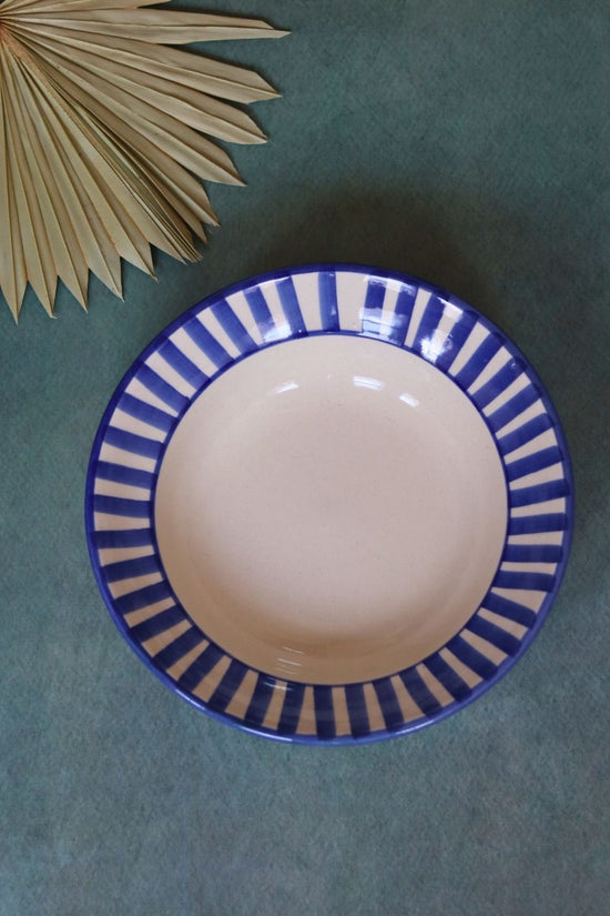 Handmade blue striped pasta plate