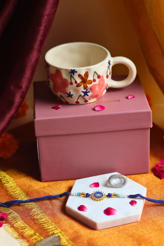 Rakhi Bloom Mug gift box with Rakhi & Earrings  with premium quality material