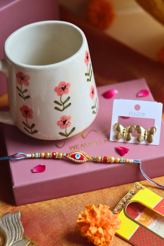 Rakhi Poppy Mug gift box with Rakhi & Earrings only for your siblings
