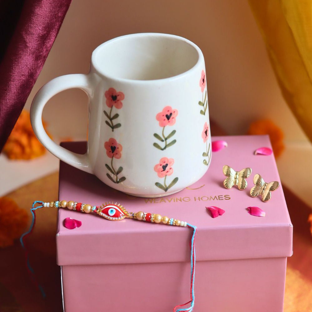 Rakhi Poppy Mug gift box with Rakhi & Earrings combo is crafted only for this rakhsha bandhan