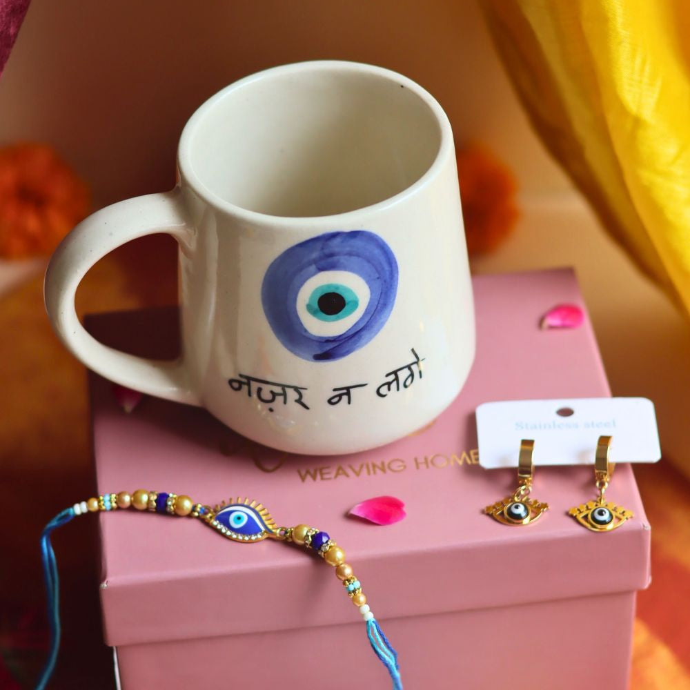  Rakhi Nazar Mug gift box with Rakhi & Earrings is crafted only for this rakhsha bandhan