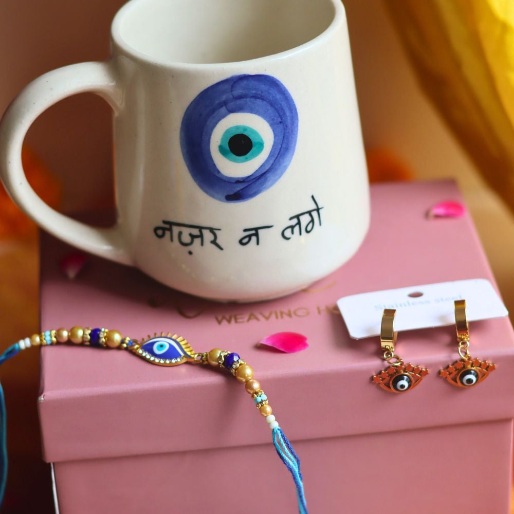 Rakhi Nazar Mug gift box with Rakhi & Earrings with premium quality material