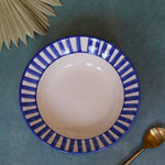 blue striped pasta plate made by ceramic