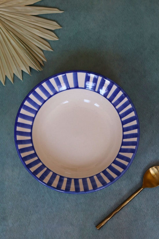 blue striped pasta plate made by ceramic