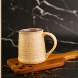 Coffee mug on wooden surface