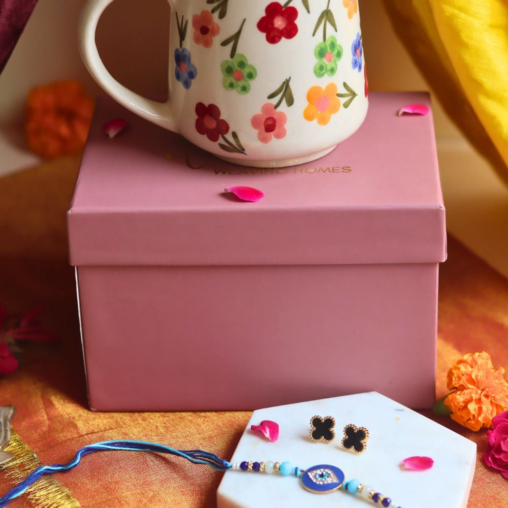 Rakhi Floral Blossom Mug gift box with Rakhi & Earrings is crafted only for this rakhsha bandhan