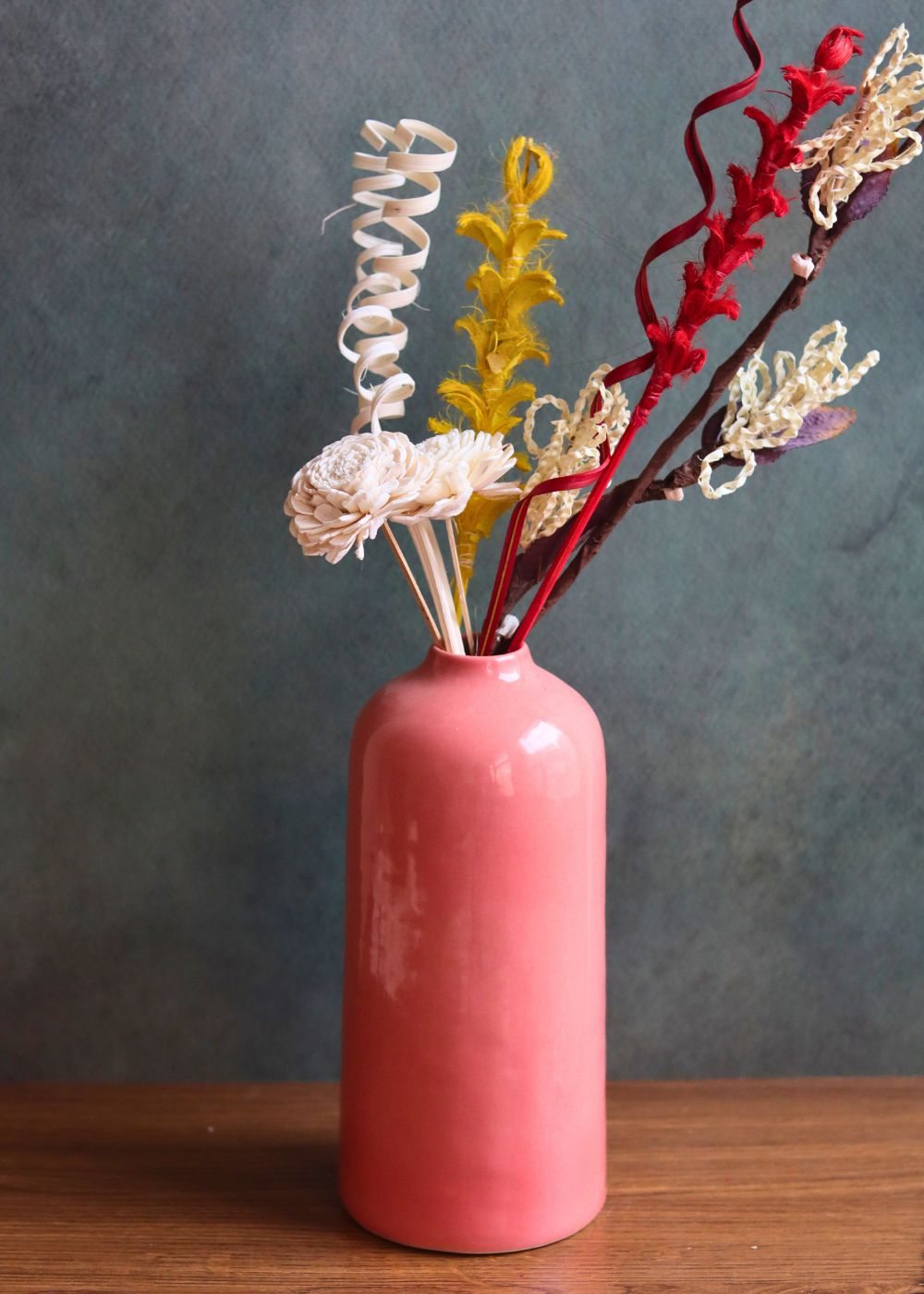 pink tall vase with Assorted bunch with beautifully crafted
