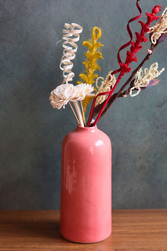 pink tall vase with Assorted bunch with beautifully crafted