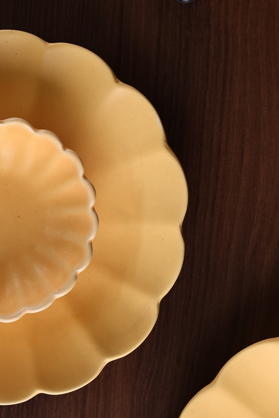 Genda phool plate and bowl closeup shot 