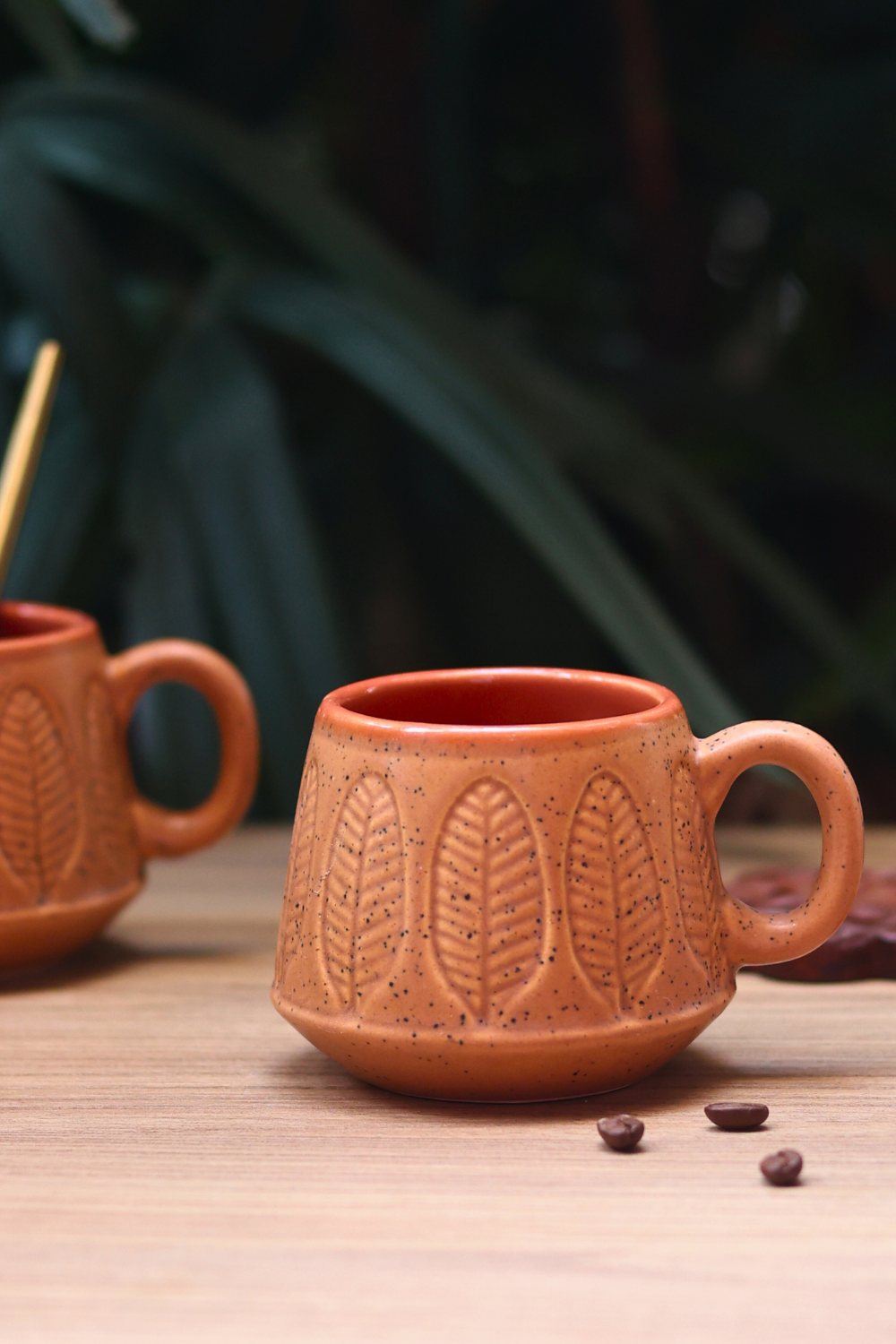 handmade brown mug with leaf design